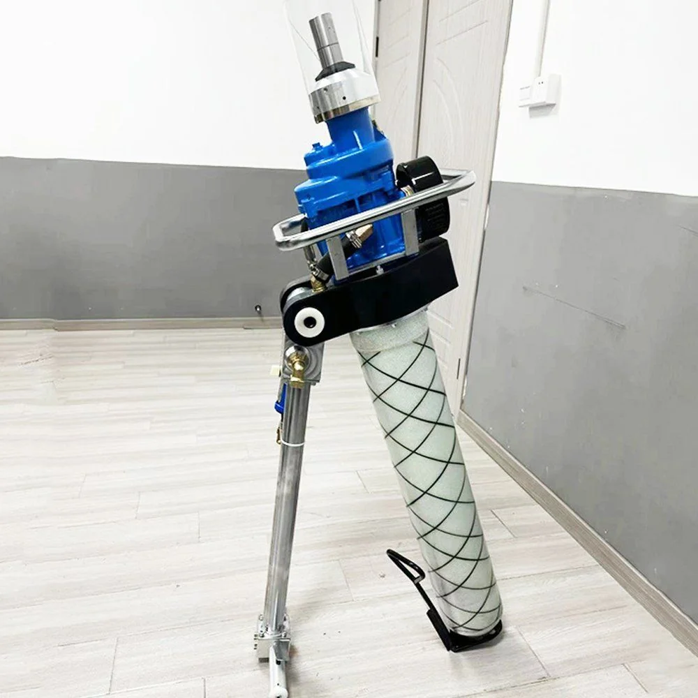 Industrial engineer repairing pneumatic drill machinery workshop